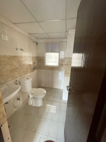 Bathroom in 2 BHK Apartment at Amrapali Golf Homes, Sector 4, Greater Noida – for Sale