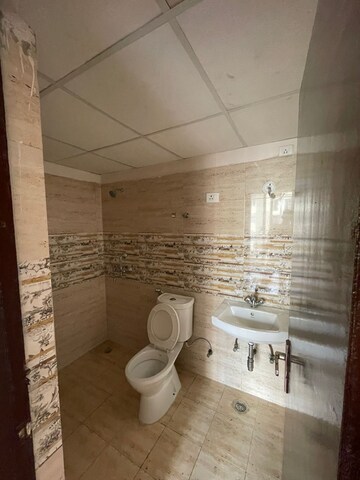 Bathroom in 2 BHK Apartment at Amrapali Golf Homes, Sector 4, Greater Noida – for Sale