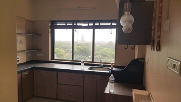 Kitchen in 4 BHK Apartment at Mahalaxmi – for Sale