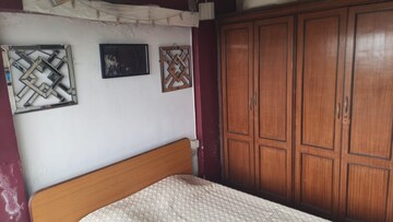 Bedroom in 4 BHK Apartment at Mahalaxmi – for Sale