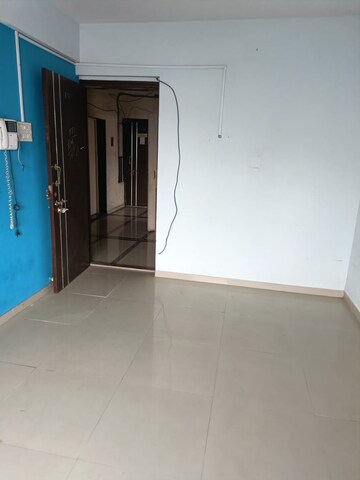 Room in 2 BHK Apartment at Pushpanjali Heights, Owale – for Sale