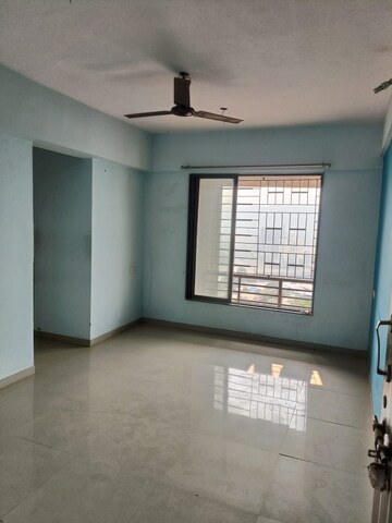Room in 2 BHK Apartment at Pushpanjali Heights, Owale – for Sale
