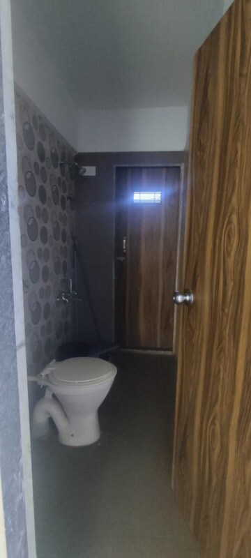 Bathroom in 2 BHK Apartment at Sudarshan Sky Heights, Bhayandarpada – for Sale