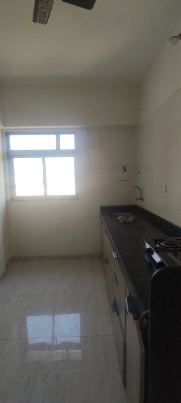 Kitchen in 2 BHK Apartment at Sudarshan Sky Heights, Bhayandarpada – for Sale