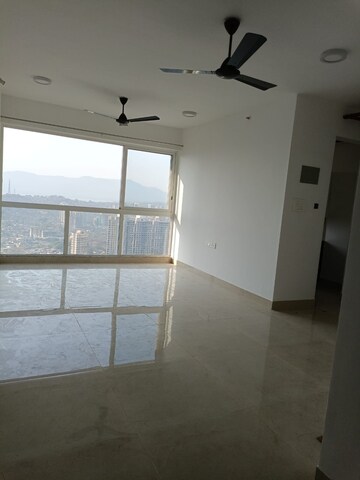 Living Room in 2 BHK Apartment at Lodha Amara, Kolshet Road – for Sale