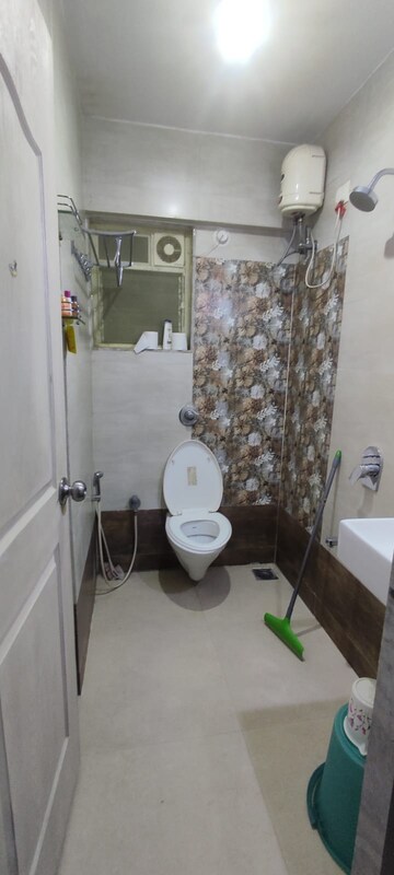 Bathroom in 2 BHK Apartment at Sai Baba Vihar Complex, Ghodbunder Road – for Sale