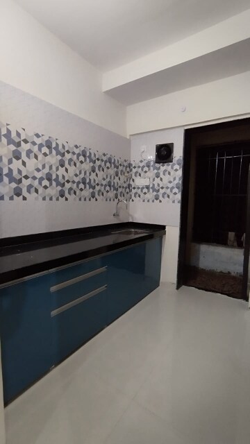 Kitchen in 2 BHK Apartment at Raunak City, Kalyan West – for Sale