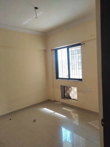 Room in 1 BHK Apartment at Gangotri Glacier CHS, Waghbil – for Sale