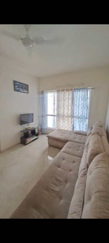 Living Room in 1.5 BHK Apartment at Lodha Amara, Kolshet Road – for Rent