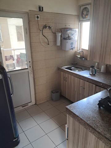 Kitchen in 2.5 BHK Apartment at Gaur City 2 - 10th Avenue, Sector 16c Greater Noida – for Sale