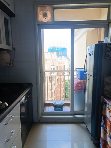 Kitchen in 3 BHK Apartment at Vijay Nakshatra, Ghodbunder Road – for Sale
