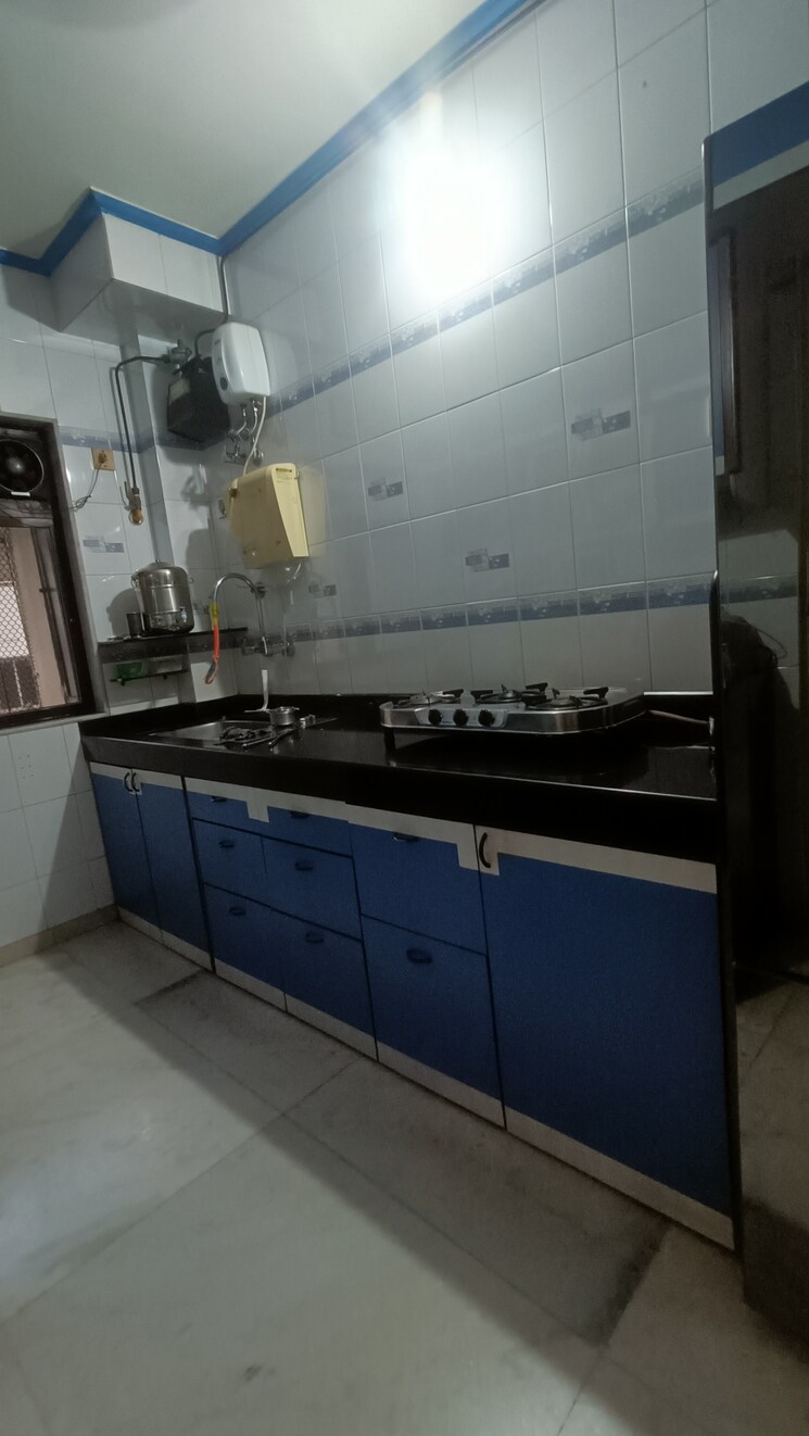 Kitchen, praneeta-chs-ltd 2 Bedroom 835 Sq.Ft. Apartment In Borivali West Mumbai 7683320