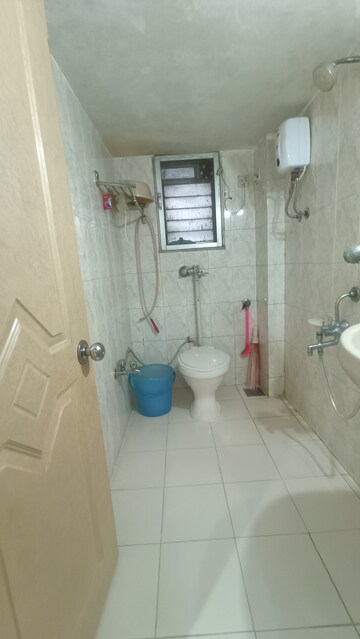 Bathroom in 2 BHK Apartment at Praneeta CHS Ltd, Borivali West – for Sale