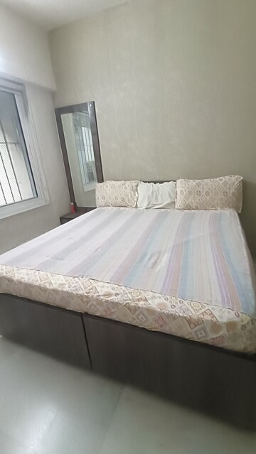 Bedroom in 2 BHK Apartment at Praneeta CHS Ltd, Borivali West – for Sale