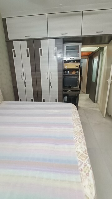 Bedroom in 2 BHK Apartment at Praneeta CHS Ltd, Borivali West – for Sale