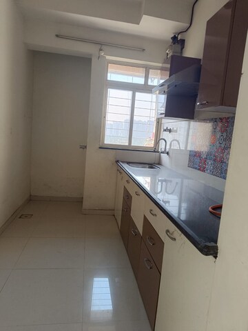 Kitchen in 1 BHK Apartment at Woods Pinewoods, Ghodbunder Road – for Sale
