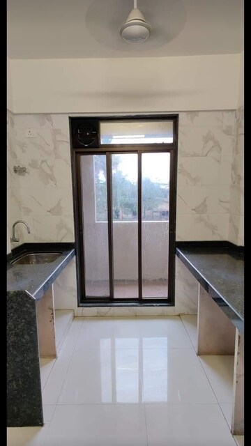 Room in 1 BHK Apartment at Raunak Delight, Owale – for Sale