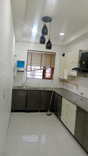 Kitchen in 4 BHK Builder Floor at Sector 85 – for Sale