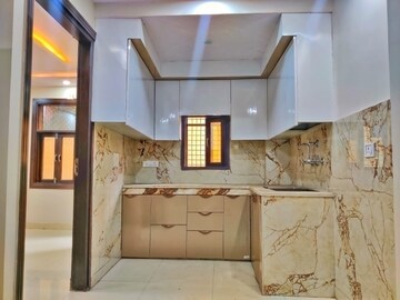 Kitchen in 2 BHK Builder Floor at Mahavir Enclave – for Sale
