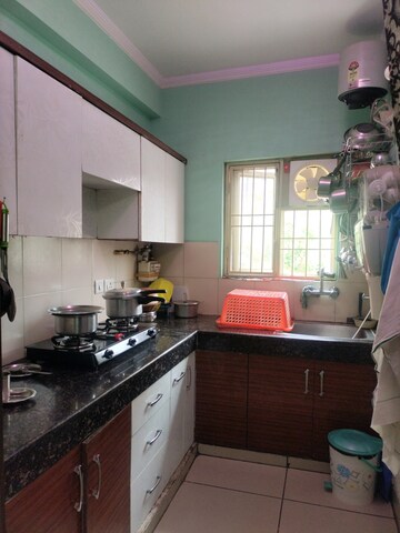Kitchen in 2 BHK Apartment at Panchsheel Greens, Sector 16 Greater Noida – for Sale