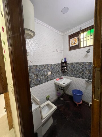 Bathroom in 2.5 BHK Apartment at KM Residency, Raj Nagar Extension – for Sale