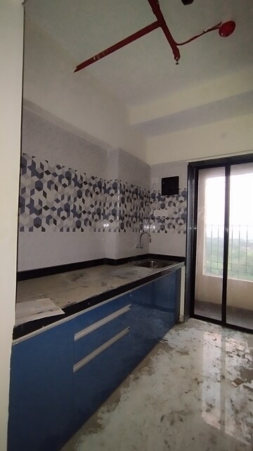 Kitchen in 1 BHK Apartment at Raunak City Sector 4, Kalyan West – for Sale