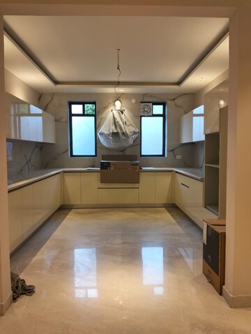 Kitchen in 4 BHK Builder Floor at Ansal Sushant Lok I, Sector 43 – for Sale