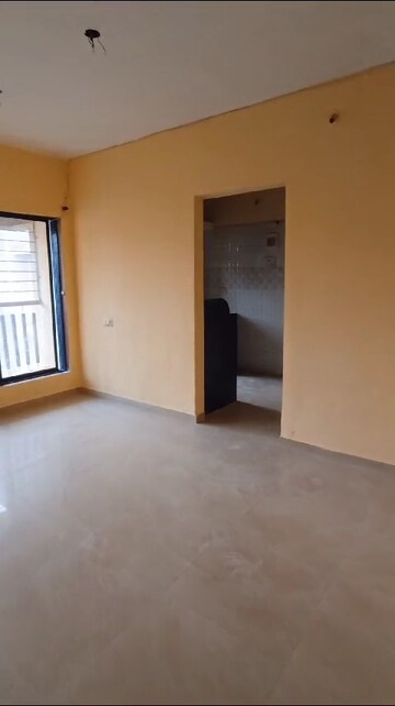 Living Room in 1 BHK Apartment at Sanskruti Heights, Nalasopara West – for Sale