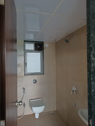 Bathroom in 2 BHK Apartment at Runwal Eirene, Balkum Pada – for Rent