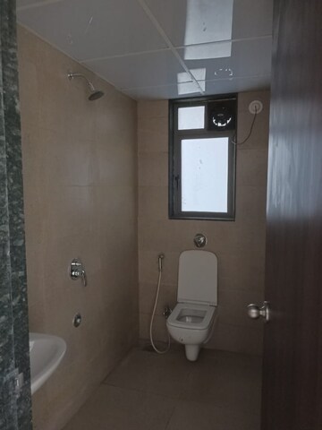 Bathroom in 2 BHK Apartment at Runwal Eirene, Balkum Pada – for Rent