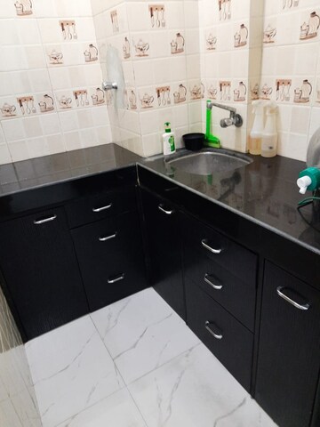 Kitchen in Studio Apartment at Piccadilly CHS, Goregaon East – for Sale