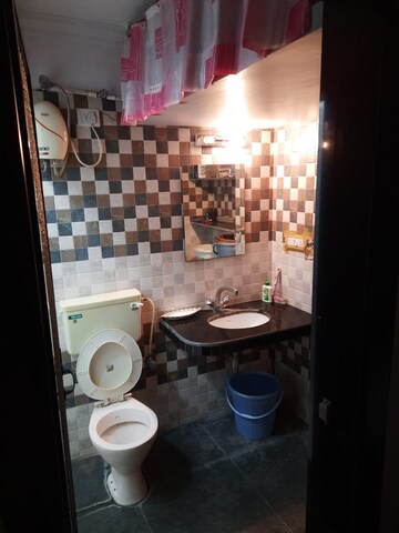Bathroom in Studio Apartment at Piccadilly CHS, Goregaon East – for Sale