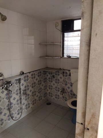 Bathroom in 2.5 BHK Apartment at Vijay Enclave, Waghbil – for Sale