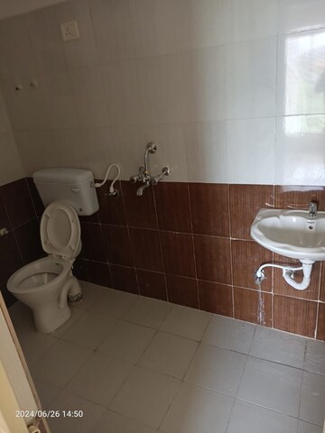 Bathroom in 6 BHK Apartment at Shiva Whispering Woods, Salaiya – for Sale