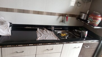 Kitchen in 2 BHK Apartment at Regency Estate, Dombivli East – for Sale