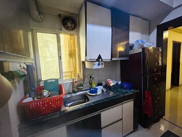 Kitchen in 3 BHK Apartment at Amrapali Golf Homes, Sector 4, Greater Noida – for Sale