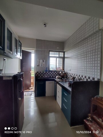 Kitchen in 1 BHK Apartment at Tanish Park, Charholi Budruk – for Sale