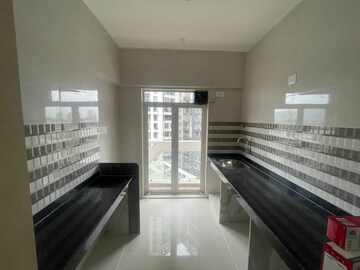 Kitchen in 1 BHK Apartment at JVM Corner Stone, Naupada – for Sale