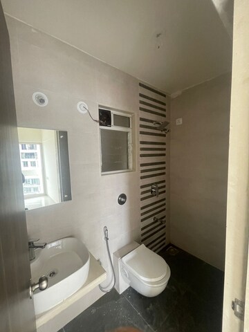 Bathroom in 1 BHK Apartment at JVM Corner Stone, Naupada – for Sale
