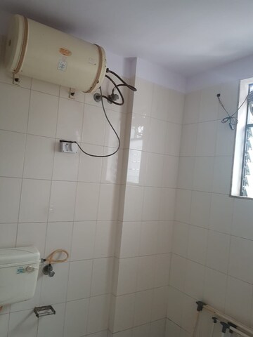 Bathroom in 2 BHK Apartment at Royal Palms, Goregaon East – for Rent