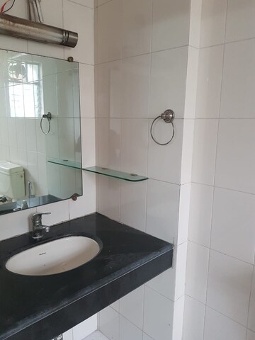 Bathroom in 2 BHK Apartment at Royal Palms, Goregaon East – for Rent