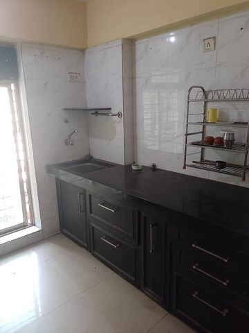 Kitchen in 1 BHK Apartment at Prathmesh View, Mira Road – for Sale