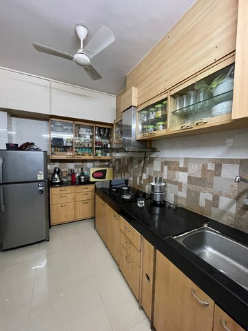 Kitchen in 2 BHK Apartment at Raj Umang 2, Dahisar East – for Sale