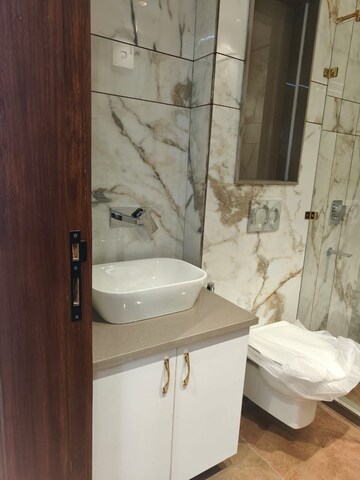 Bathroom in 3 BHK Apartment at Ramprastha Skyz, Sector 37d – for Sale