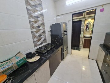 Kitchen in 1 BHK Apartment at JP North Aviva, Mira Road – for Sale