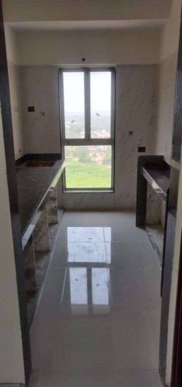 Kitchen in 2 BHK Apartment at Dharti Presidio, Malad West – for Sale