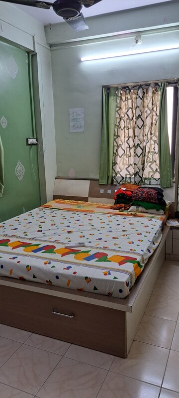 Bedroom in 2 BHK Apartment at Brahmand CHS, Brahmand – for Sale