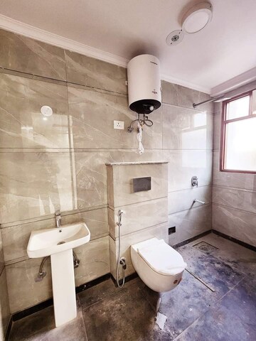 Bathroom in 3 BHK Builder Floor at Chattarpur – for Sale
