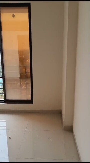 Master Bedroom in 1 BHK Apartment at Viva Ganga CHS, Nalasopara West – for Sale