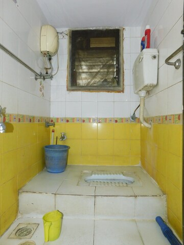 Bathroom in 2 BHK Apartment at Alliance Ravi Kiran, Mulund East – for Sale